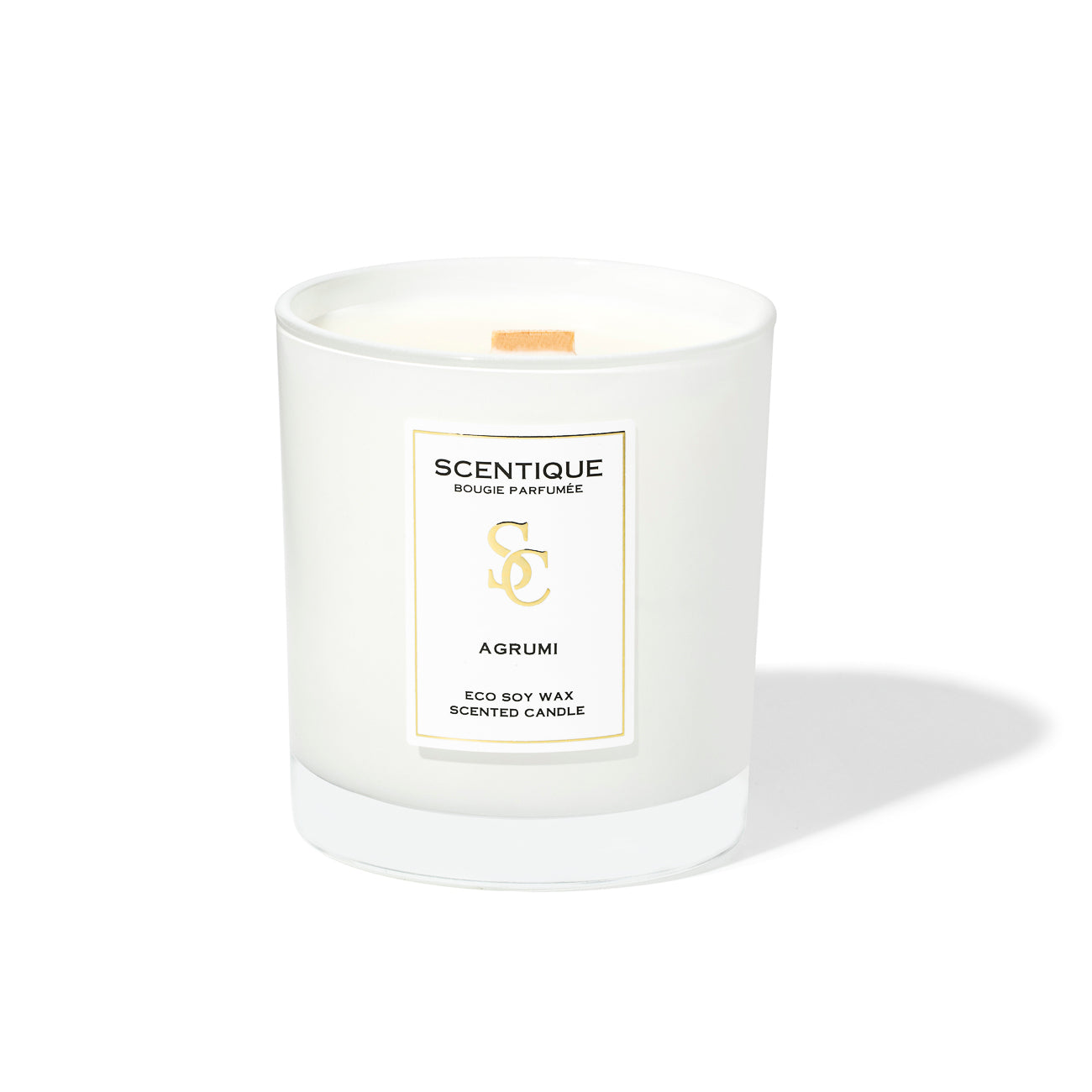 AGRUMI цитрусова ароматна свещ в луксозен и елегантен стъклен съд от SCENTIQUE